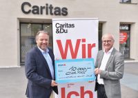 Scheckübergabe (c) Caritas